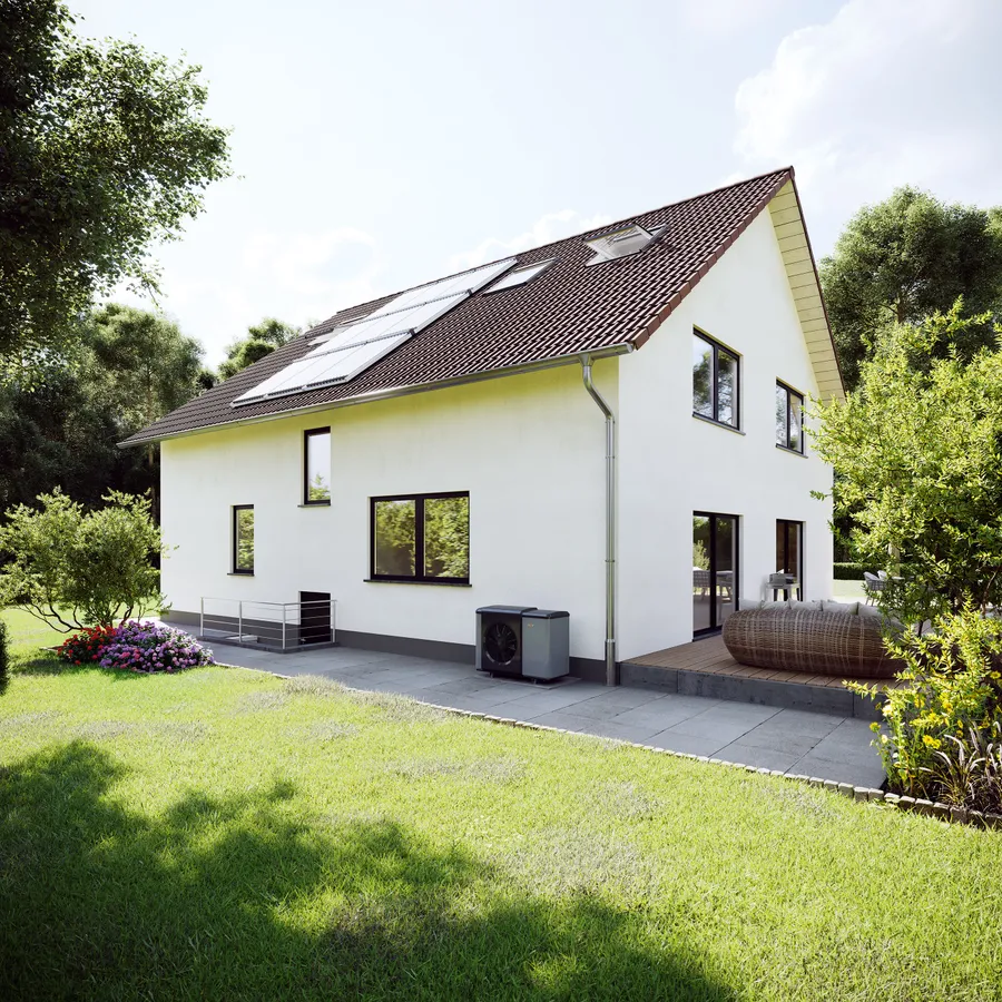Einfamilienhaus mit WOLF-Wärmepumpe im Garten